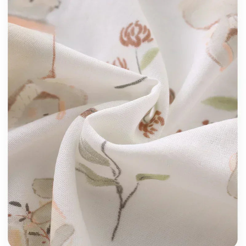 Cotton & Bamboo Muslin Short Sleeve Romper - Blue Dinosuar - Organic Cotton Clubs